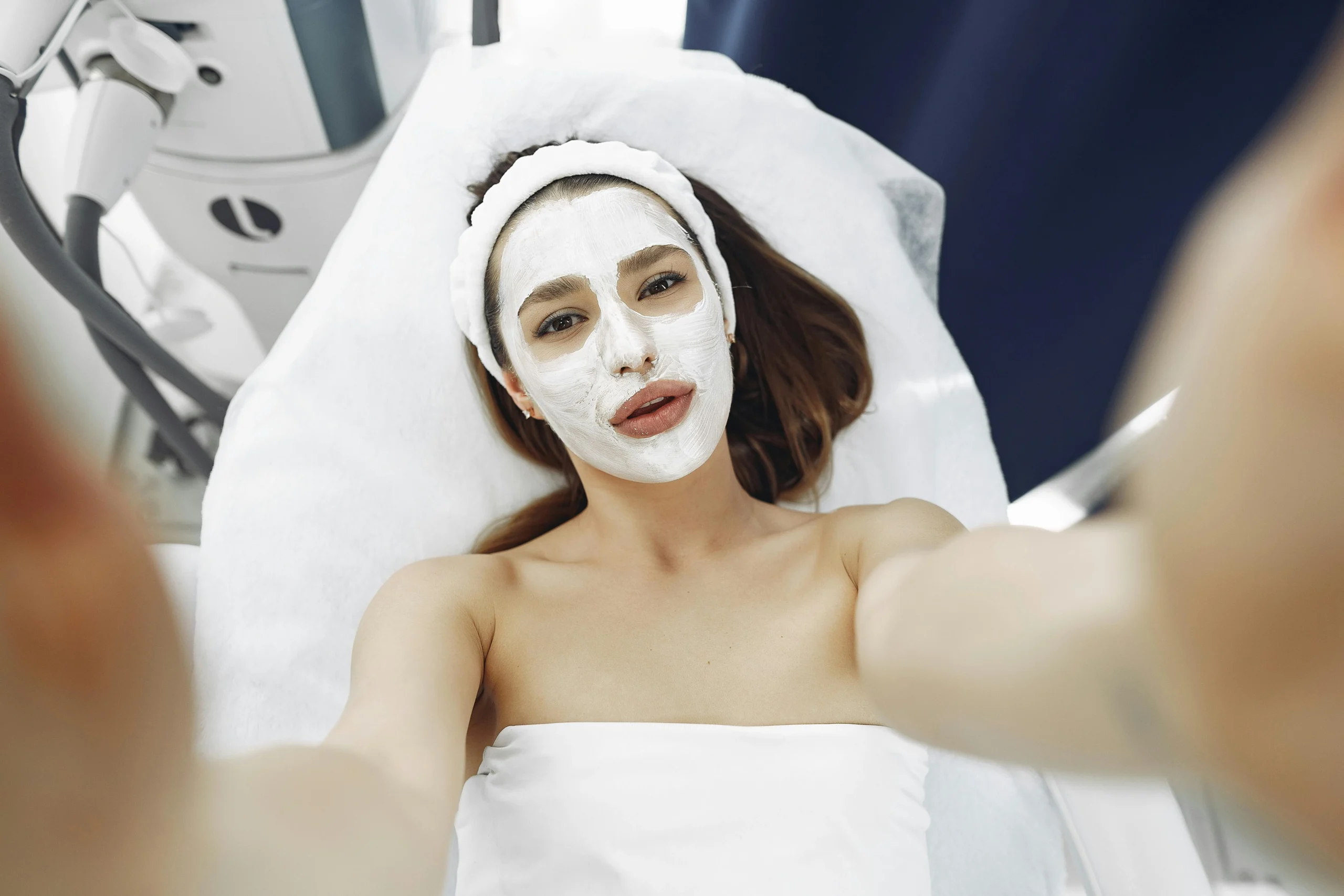 of_a_person_applying_a_hydrating_face_mask_for_skin_rejuvenation__Create_an_ultra_realistic_image_with_perfect_contrast_by_emphasizing_depth