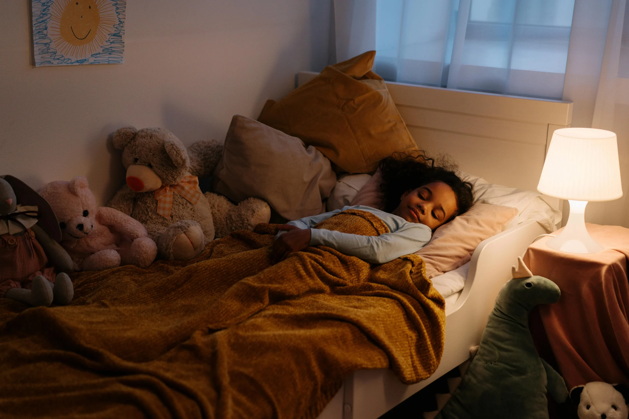 of_a_person_sleeping_peacefully_in_a_cozy_bed_with_soft_pillows_and_blankets