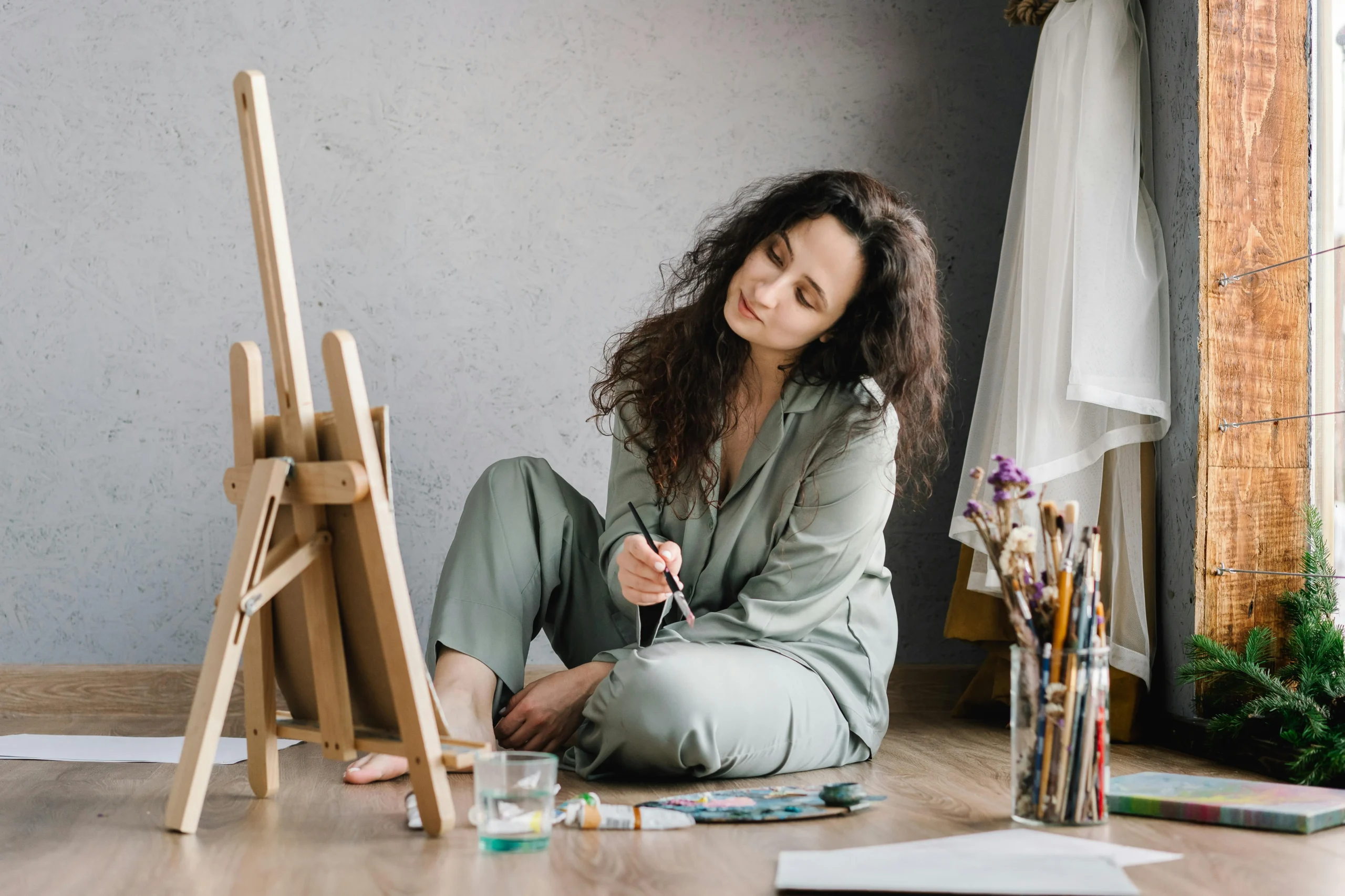 of_a_person_engaging_in_a_creative_hobby_like_painting