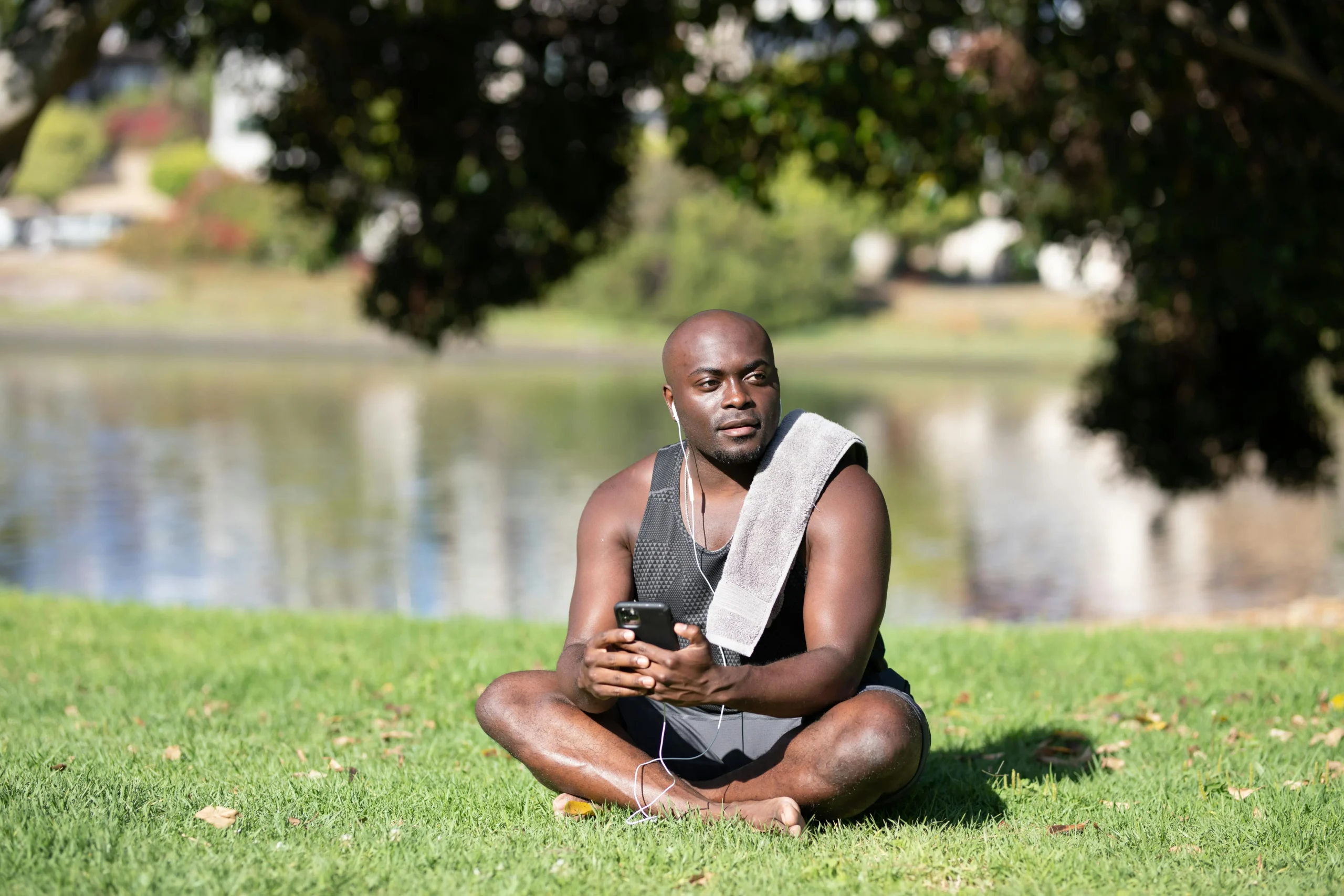 of_a_person_sitting_cross_legged_with_headphones