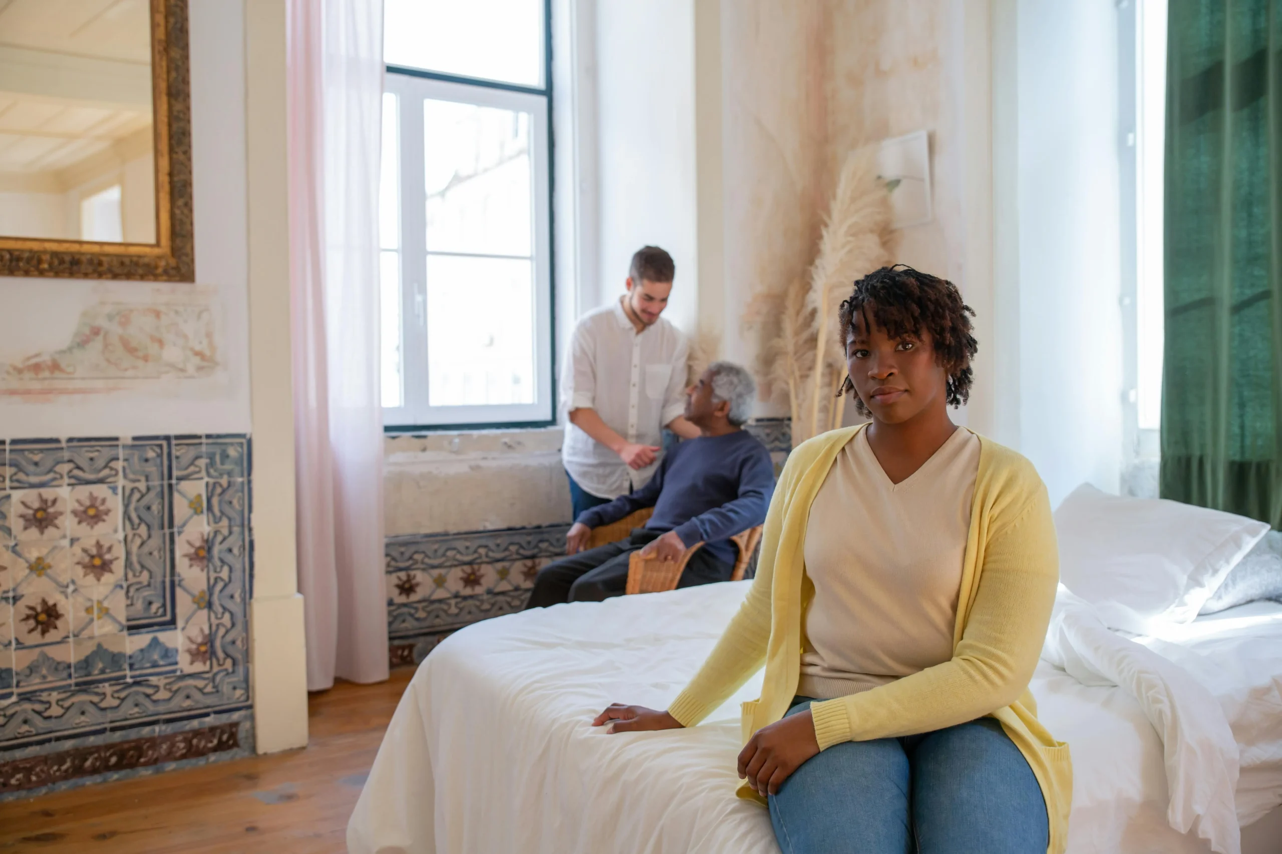 of_a_person_sitting_near_a_light_therapy_box