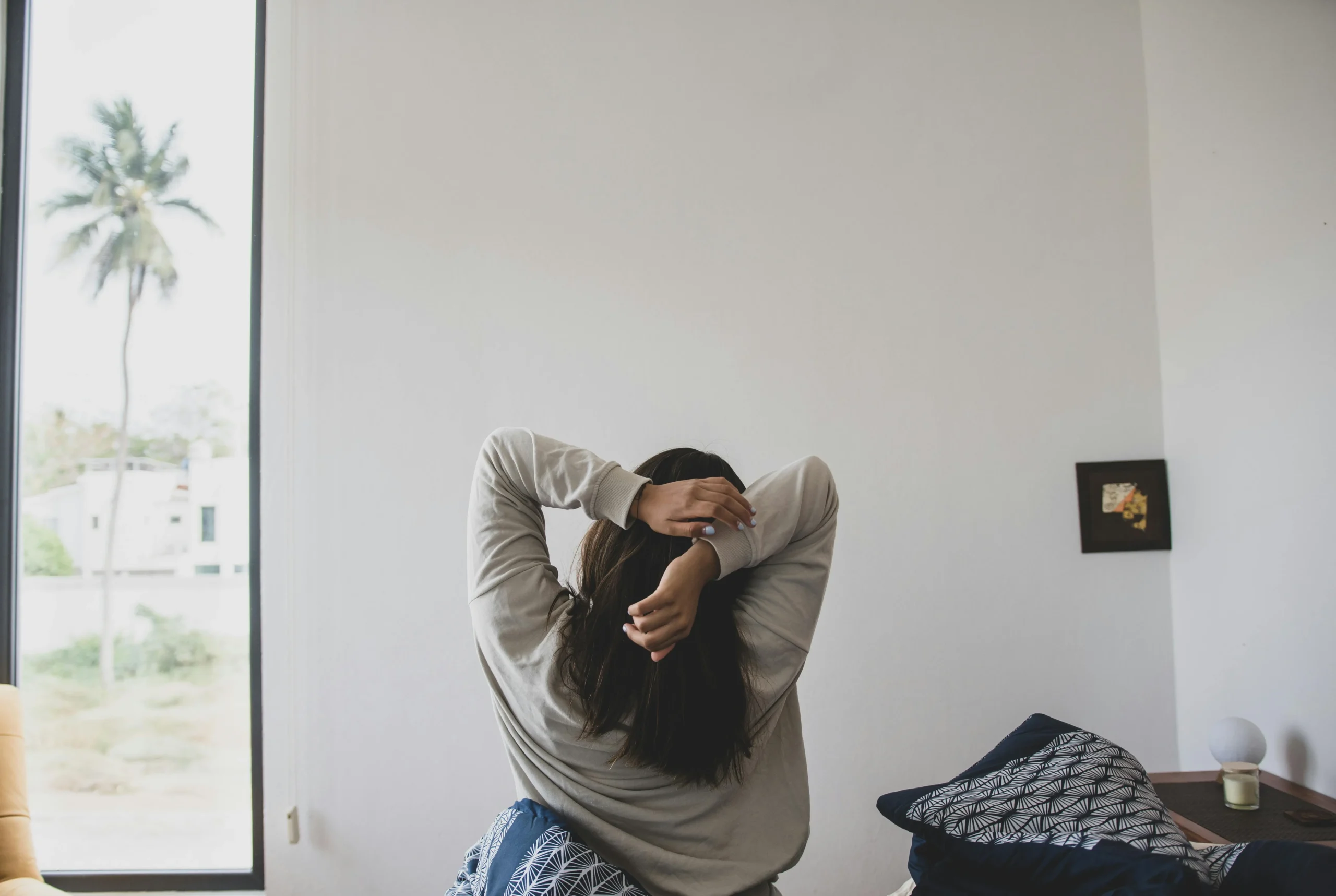 of_a_person_stretching_their_arms_and_back_in_a_well_lit_office_space__Create_an_ultra_realistic_image_with_perfect_contrast_by_emphasizing_depth