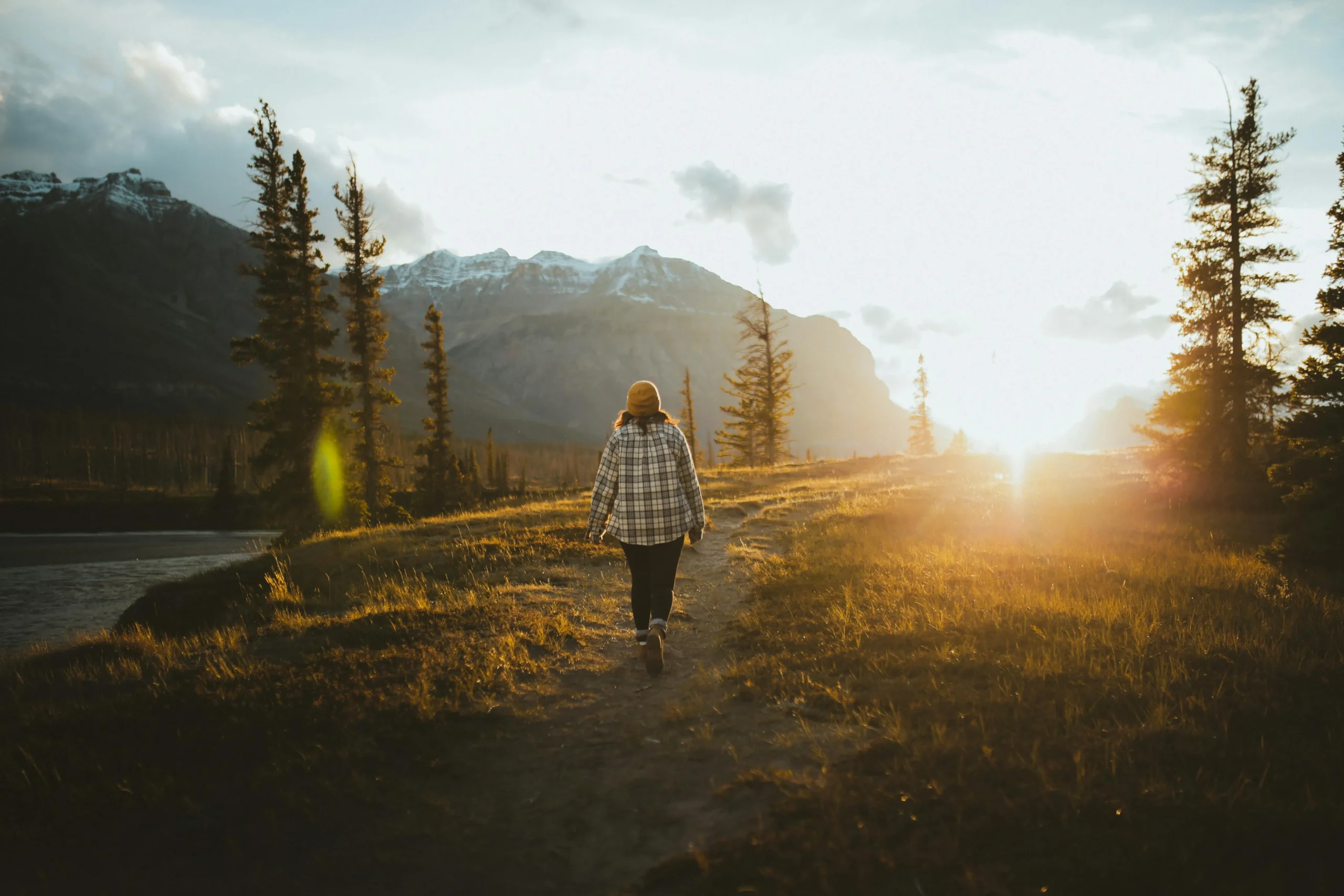 of_a_person_walking_through_a_forest_trail