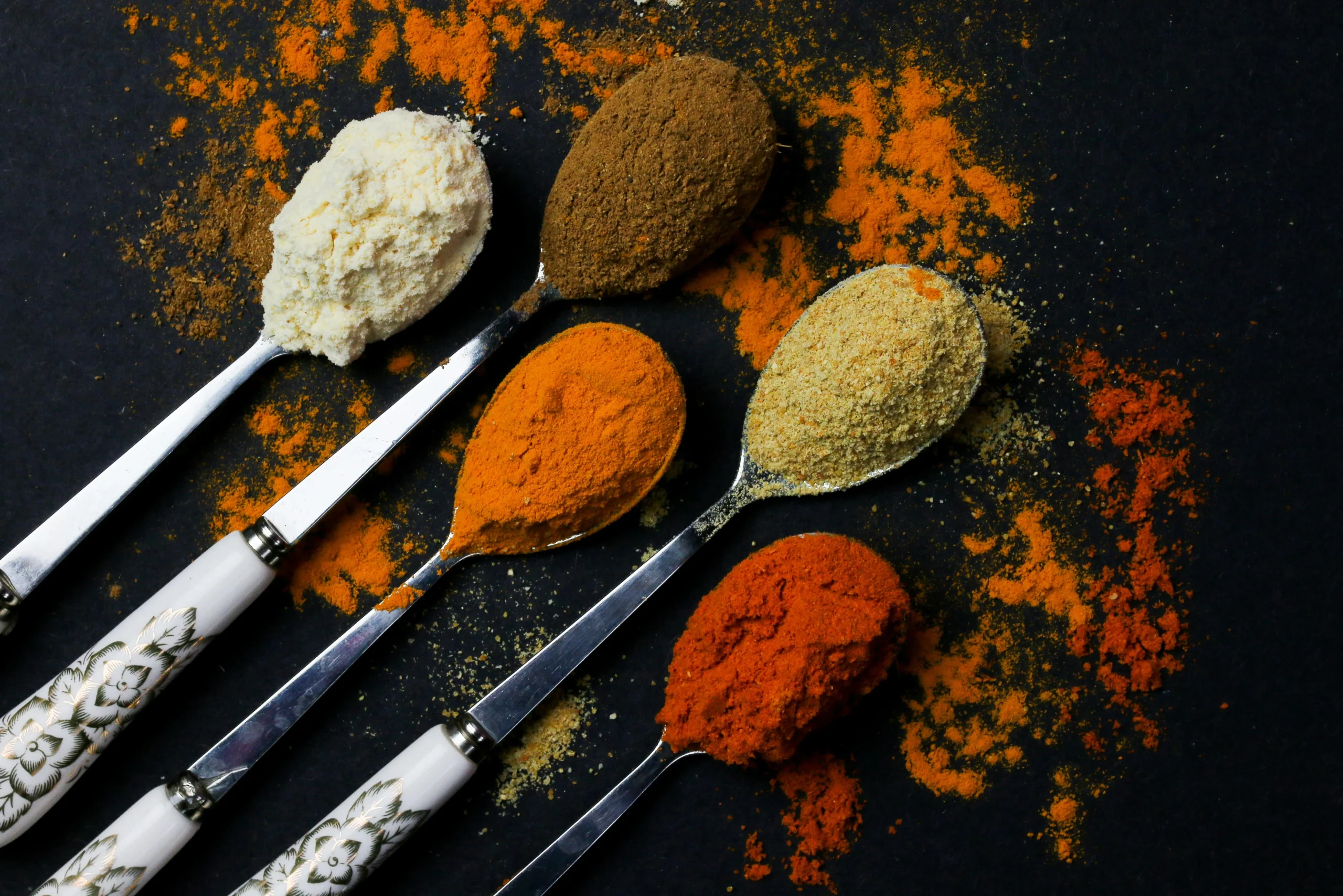 of_a_variety_of_colorful_spices_and_herbs_like_turmeric